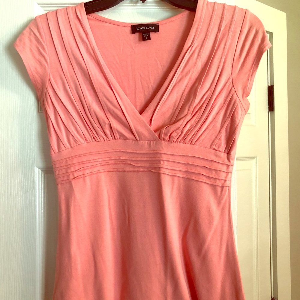 Bebe V-neck capped sleeve shirt, size small